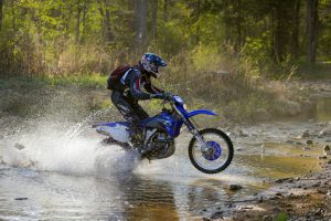 Vladivostok, Russia - may 1, 2014: cars, motorcycles, ktm Enduro and ATV, go off-roading in five-day race Russian rally 2014